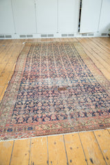 Historic Malayer runner featuring an allover Herati pattern with visible pile wear.