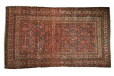 Antique Persian Malayer hand-knotted rug, intricate multi-panel lattice vinery, rich reds, ivory, and cobalt blue. 5'4
