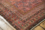 Corner detail of antique Malayer carpet, intricate lattice vinery and soft red-blue multi-panel design.