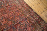 Intricate multi-panel lattice pattern on antique Malayer carpet, with visible foundation.