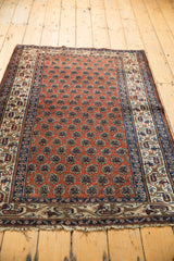 Vintage Malayer rug, allover madder root red boteh pattern, navy blue and ivory borders.