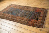Late 19th century Kurdish rug with varying boteh motifs and rich madder red borders.