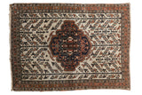 Vintage Afshar rug, ivory field, serrated navy and terracotta medallion, tree of life, birds.