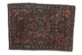 Vintage Lilihan rug mat with allover plum, gold, and blue floral palmette design, 2' x 2'11