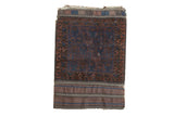 Hand-knotted antique Belouch rug mat with deep indigo and madder root red geometric patterns.