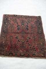 Antique Mohajeran Sarouk rug mat: detailed plum and navy blossomed floral, mostly even wear.