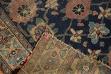 Antique Kurd rug fragment revealing navy pile with Veramin motifs and woven foundation.