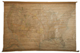 Antique 1898 United States pull-down wall map, aged beige, sectioned colored territories.
