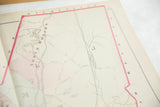Hand-colored pink border on the North Woburn section of an antique Massachusetts atlas map.
