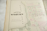 Antique Woburn atlas map showing the Horn Pond shoreline and pastel-colored landowner plots.