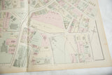 Hand-colored landowner plots and streets on a 19th-century Woburn, MA atlas map.