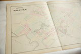 Angled view of the 1875 Woburn atlas map showing the center fold, Horn Pond, and property lines.