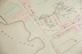 Landowner properties with pastel color-washes near Horn Pond on an antique Woburn atlas map.