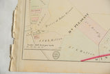 Worn left edge and cartographic scale on an antique 1875 Woburn, Massachusetts map.