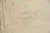 Angled detail of an 1875 Woburn map showing the S.O. Pollard Tannery and color-tinted parcels.