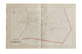 An antique 1875 atlas map of Woburn, Massachusetts, showing property lines and railroad routes on aged paper.
