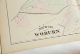 The bold 'WOBURN' title and G.M. Hopkins 1875 copyright on an antique atlas plate.