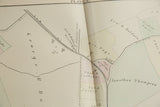 Close-up of the center fold on an 1875 Woburn map showing property lines and landowners' names.