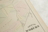 Antique 1875 Woburn map detail displaying 'WOBURN' text and property plots.