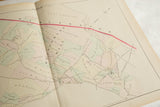 Close-up on Plate O of an antique Woburn map, detailing hand-drawn landowner parcels.