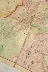 Antique Boston map showing the Dorchester and Jamaica Plain neighborhoods along a central fold.
