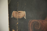 Clasped hands with white cuffs on dark attire, displaying paint chipping.