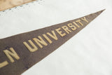 Detail of antique Lincoln University felt pennant with sewn raised lettering.