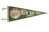Vintage New Bay Shore Park pennant in green felt with a graphic of a woman at the beach.