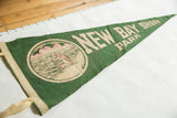 Angled view of the vintage New Bay Shore Park pennant, highlighting its graphic and felt texture.