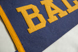 Yellow block letters BA on the blue vintage Baldwin felt pennant.