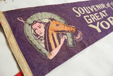 Vintage Great York Fair felt pennant with girl, horse, and 'Souvenir' text on purple.