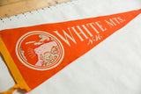 Orange felt pennant featuring white mountain graphic and 