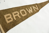 Textured beige felt 'ROWN' lettering on the antique Brown University wool pennant.