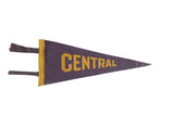 Vintage Central felt pennant in purple with gold block lettering and trim.