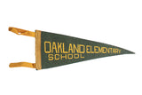 Vintage Oakland Elementary School felt pennant in green with bold yellow lettering and ties.