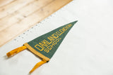 Vintage Oakland Elementary School pennant laid flat to show its 12-inch length for scale.