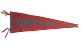 Vintage Montreal felt pennant banner, red with sewn blue letters, circa 1920s, 8x25 inches.