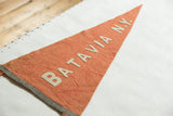 Visible creasing on antique orange felt Batavia NY pennant with off-white letters.