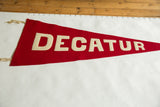 Red wool felt triangular pennant with cream stitched 