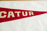 Right portion of the antique red felt pennant featuring cream 