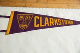 Close-up of the gold ram graphic on purple Clarkstown Rams felt pennant.