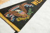 Vintage West Point felt pennant showing eagle emblem, US shield, olive branch, yellow trim.