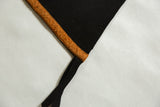 Vintage Princeton University pennant's black felt corner, orange trim, and tie details.