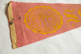 Pink felt pennant with yellow USC emblem and aged binding edge.