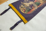 Textured dark purple felt pennant corner, yellow trim, and Balboa Park graphic.