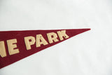 Antique red felt pennant tip showing 