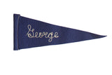Dark blue vintage felt pennant with 'George' embroidered in white script, 4x10 inches.