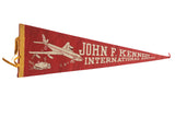 Vintage John F. Kennedy International Airport felt pennant with white plane and boarding scene on red, 9x25 inches.