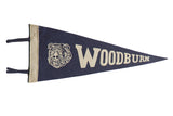 Vintage Woodburn felt pennant, dark blue with white bulldog mascot, 8x17 inches.