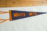 Textured dark blue felt and bright orange ties on the vintage souvenir pennant.